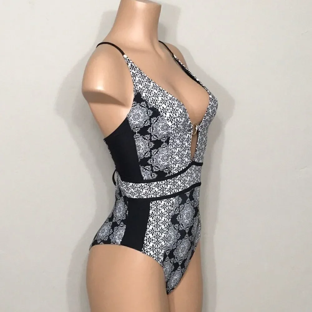 Medallion print plunge swimsuit. RUNS SMALL. NWOT